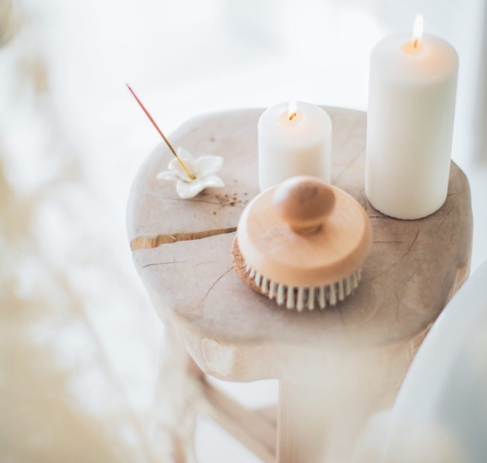 Incense and White Candles on a Stool